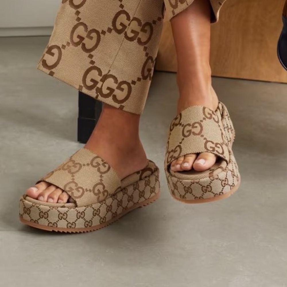 Excellent condition Gucci GG platform sandals.